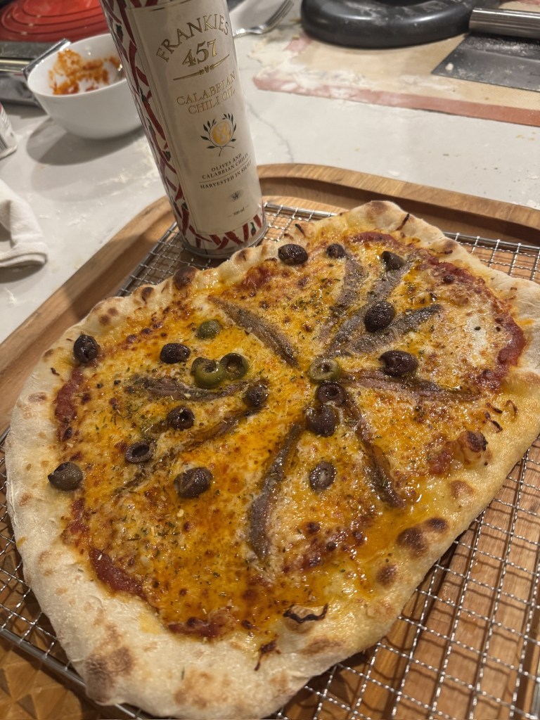 Anchovy and olive pizza