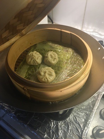 Soup dumplings in the steamer