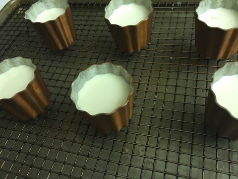 Canelé batter in the molds