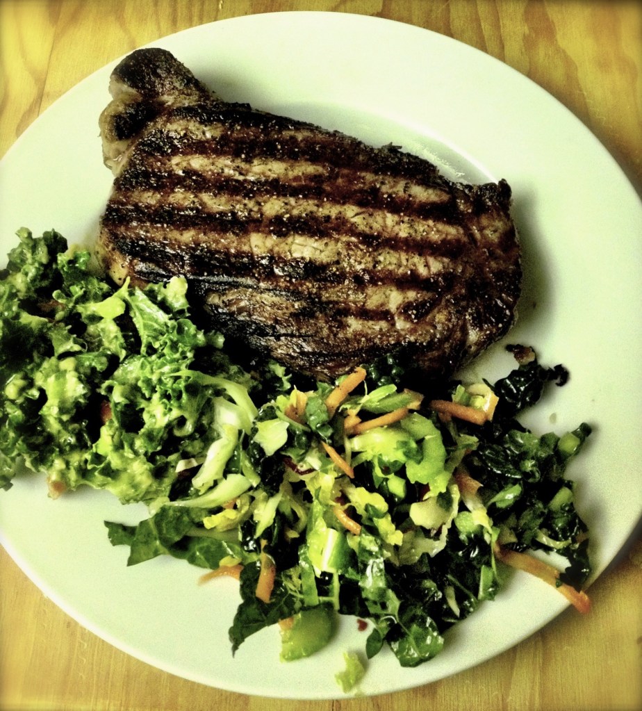 Grilled steak with kale slaw