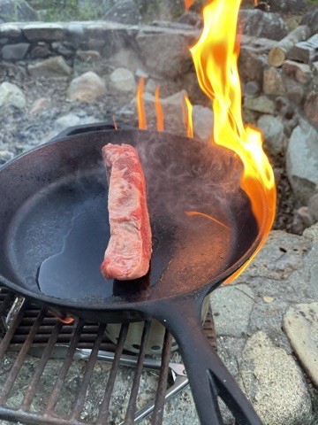Campfire steak sear