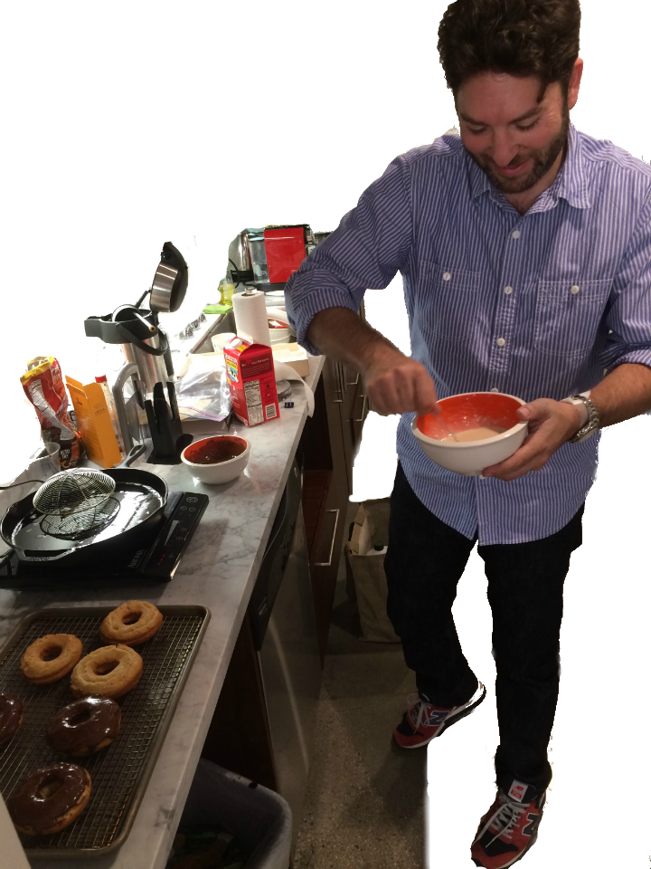 Alex, aka The Dorf, whisking in the kitchen